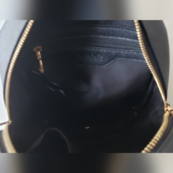 BEBE RINA LOGO SMALL BLACK SIGNATURE LOGO PRINT BACKPACK BAG W/ POUCH - Picture 8 of 12